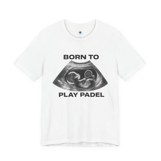 A white short-sleeve crewneck t-shirt featuring a black graphic print of a fetal ultrasound scan with the text 'BORN TO PLAY PADEL' printed above and below the image.