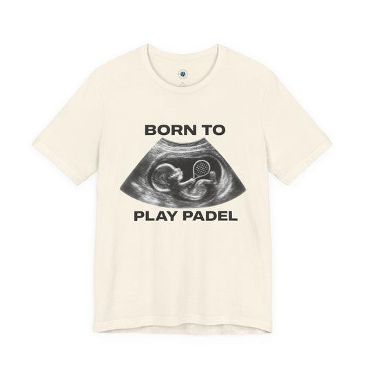 An off-white short-sleeve t-shirt with a black graphic of an ultrasound showing a fetus and the text 'BORN TO PLAY PADEL' printed on the front.